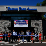 cutting the ribbon at the {PRACTICE_NAME} grand opening