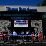 cutting the ribbon at the {PRACTICE_NAME} grand opening