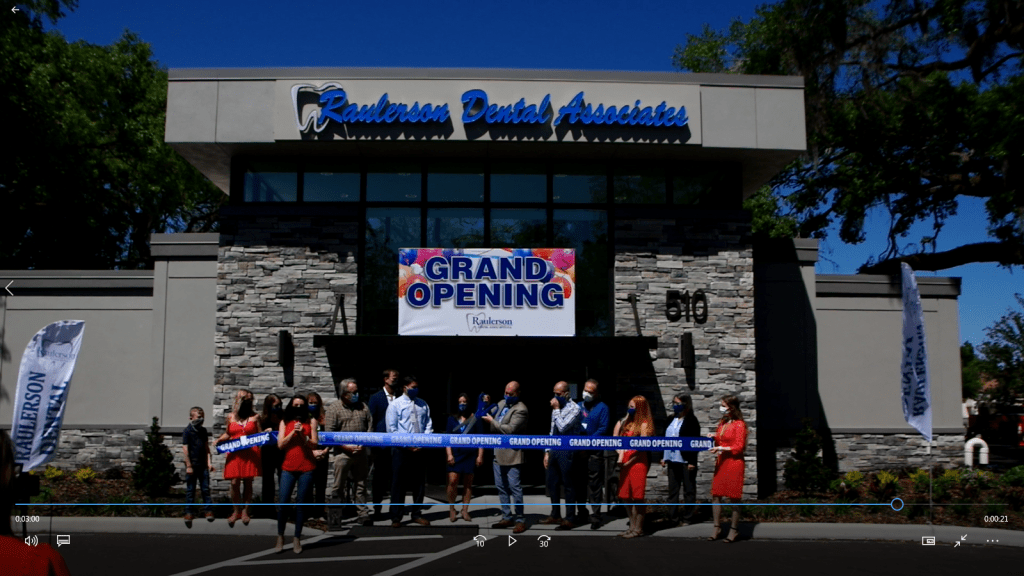 cutting the ribbon at the {PRACTICE_NAME} grand opening