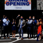 cutting the ribbon at the {PRACTICE_NAME} grand opening