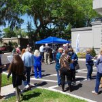 Crowd outside of {PRACTICE_NAME} at the grand opening