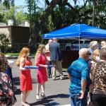 Crowd outside of {PRACTICE_NAME} at the grand opening