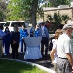 Crowd outside of {PRACTICE_NAME} at the grand opening