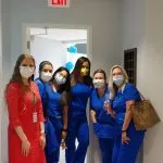 Staff at the grand opening of {PRACTICE_NAME}